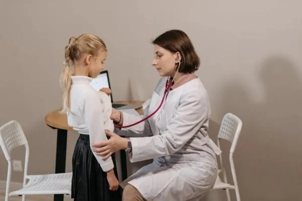 a kid  and a doctor