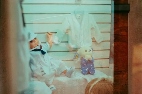 a doll and a baby dress