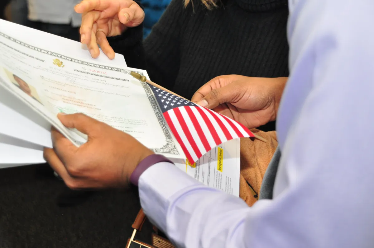 First, congratulations, in case your naturalization interview is approaching. It is one of the last stages of the process of becoming a U.S. citizen. However, the interview is not only about asking and answering questions, but it is also about arriving and bringing the correct documentation that has a potential of ruining your or a successful day at USCIS. The fact is, when you are ready, there is nothing to fear. This is what you should know about the process of the interview, what documents to present, the questions you will receive, and what would happen in case something is not going as planned.  What Happens at the Naturalization Interview? An interview averagely takes 20-30 minutes and is held at a local field office of the USCIS. In the appointment, an officer of USCIS will: Review your N-400 application Ask you questions about your background Administer the English and civics tests Determine if you qualify for citizenship   So if you said you were married, they may ask for evidence of a real relationship: shared bills, joint leases, kids’ birth certificates, etc. If everything is in order, you may be scheduled for your oath ceremony the same day or shortly after. If not, your case may be continued or denied, depending on the issue.  What You Should Bring To The Interview USCIS expects you to bring original and updated documents, even if you already submitted copies with your application.   Final Checklist: What to Bring for Naturalization Interview Appointment notice Green card State-issued photo ID All passports & travel docs Tax returns or transcripts Marriage & divorce records (if any) Selective Service proof (if applicable) Court records (if applicable) Name change docs Any evidence supporting your application  1. Your Appointment Notice This is usually Form N-445 (Notice of Naturalization Interview) or Form N-652 (Interview Results). This letter has the date, time, and location of your interview, don’t lose it, and bring the original with you. If it was emailed, print it. USCIS needs to scan the barcode.  2. Your Green Card Carry the original Permanent Resident Card (Form I-551), with you, even when it is expired. In case it was lost or stolen and you have filed form I-90 to get a replacement, you are advised to bring your I-797C receipt notice to show evidence.  3. State-Issued Photo ID In most cases, it is a case of the driver or so-called state ID, which is particularly vital when your green card expires or is misplaced.  4. Passports and Travel Records USCIS would like to see all the passports and travel documents that you would have obtained since attaining permanent resident status. They will analyze your time abroad and sure that you passed the physical presence test. TIPS: If you have recently travelled, do carry a printout of your travel history on CBP i-94 Web site.  5. Tax Documents Especially if you’ve had long trips outside the U.S., bring copies of your federal tax returns or IRS tax transcripts from the last 3–5 years. If you filed jointly with a spouse, include the full return, not just your portion.  6. Proof of Marital Status Depending on your situation, bring originals (and maybe certified translations) of: Marriage certificate(s)   Divorce decrees   Death certificate (if widowed)   Proof of spouse’s U.S. citizenship (if applying under the 3-year rule)    7. Selective Service Proof (for men 18–26 years old) If you were required to register for Selective Service and you didn’t, bring an explanation letter and supporting evidence. If you did register, print proof from the Selective Service website.  8. Proof of Legal Name Change If your name has changed, bring court orders, marriage certificates, or other documents showing how and why.  9. Supporting Documents for Criminal History (if applicable) If you’ve ever been arrested, even if charges were dropped, bring certified court dispositions. This includes: Police reports   Court records   Probation documents  Other Documents You Might Need Depending on your situation, it’s a good idea to bring: Work authorization card (EAD), if you have one   Income statements (like W-2s or pay stubs)   School records (for applicants under 18 or under special circumstances)   Medical waiver (Form N-648) if applying for an exception to English/civics test    NOTE: Not all legal issues automatically disqualify you, but not disclosing them can.   Should You Bring a Lawyer? If your case is straightforward, many applicants go alone. But if you have complications in your record, such as: A criminal history   Immigration violations   An inconsistent timeline   A marriage-based green card followed by a divorce   …it’s strongly advised to bring an immigration attorney. The officer will ask questions based on what’s in your file, and what’s not. Legal guidance helps avoid misunderstandings that can lead to delays or denials.  Will They Ask About Everything on the N-400? Yes. You’ll be asked to confirm or clarify your answers on the N-400, sometimes in great detail. Common topics include: Your full legal name and any name changes   Travel outside the U.S. in the last 5 years   Work and living history   Tax filing history   Criminal background   Memberships in organizations   Allegiance to the U.S. Constitution   It’s important to answer honestly. If a mistake was made on your application, don’t panic, just explain the situation clearly. USCIS will consider whether it was an error or a deliberate misrepresentation.  What About the English and Civics Tests? Unless you qualify for an exemption (based on age and years of residency), you must pass both tests: English test: Reading, writing, and speaking.   Civics test: 10 questions about U.S. history and government. You must get at least 6 right to pass.   IMPORTANT: If you fail either part of the test, you’ll get a second chance 60–90 days later. But if you fail twice, your application will be denied.  Can USCIS Deny You After the Interview? Yes. Common reasons include: Failing the English or civics test   Inconsistent answers or suspected fraud   Missing documents   Criminal history that shows lack of “good moral character”   Extended trips outside the U.S. that broke continuous residence   If your case is denied, you’ll receive a written explanation. In some cases, you can file an appeal (Form N-336), but not all cases qualify, and not all appeals succeed.  Do You Need to Bring Your Spouse? Only if USCIS asks. Not always, but in some marriage-based cases, USCIS may request that your spouse attend. Check your interview notice carefully, and consult with your attorney if you're unsure. This usually applies if: You’re still within the conditional residency period   You divorced shortly after receiving your green card   There are questions about the legitimacy of your relationship   Check your interview notice, if your spouse is required, it will say so clearly.  What Happens After the Interview? If everything checks out, you’ll be scheduled for your naturalization oath ceremony, the final step where you take the Oath of Allegiance and officially become a U.S. citizen. Some ceremonies happen the same day; others are scheduled within a few weeks. If you're denied for another reason, such as something in your background that makes you ineligible, you might be able to appeal, though the success rate is low. That’s why working with an immigration attorney ahead of time is the best way to avoid this outcome. If USCIS needs more information they’ll give you a request for evidence (RFE) with clear instructions.   Don’t Make These Common Mistakes Showing up without your green card   Forgetting court documents for past arrests   Assuming USCIS already has your documents, they might, but they want to see what you bring   Submitting copies without originals (they’ll want to see both)   If you’re unsure about anything on your N-400, now’s the time to go over it with a legal expert. If your answers don’t match up with your documents, or you misunderstand a question, it could delay your approval or worse.   Final Thought Your interview is more than a formality, it’s a critical checkpoint. If you’re unsure about your case, don’t guess. Preparation makes the difference between approval and delay (or denial).  At Guerra Bravo Law, we’ve helped countless families navigate the process with confidence. If you need help preparing, reviewing your documents, or attending the interview with legal support, our team is here.