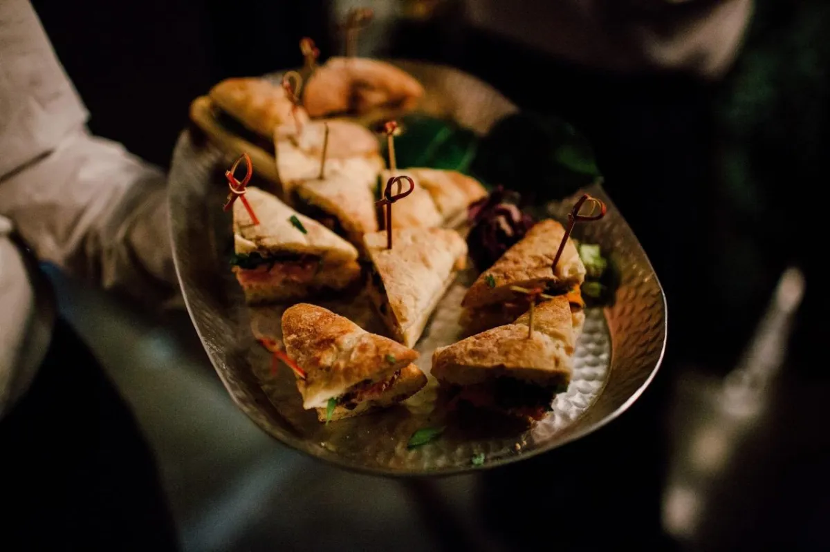 Shores Kitchen Santa Monica- platter of amazing sandwiches carried by waiter