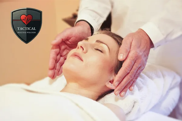 woman in Reiki session like offered at Tactical Health & Wellness