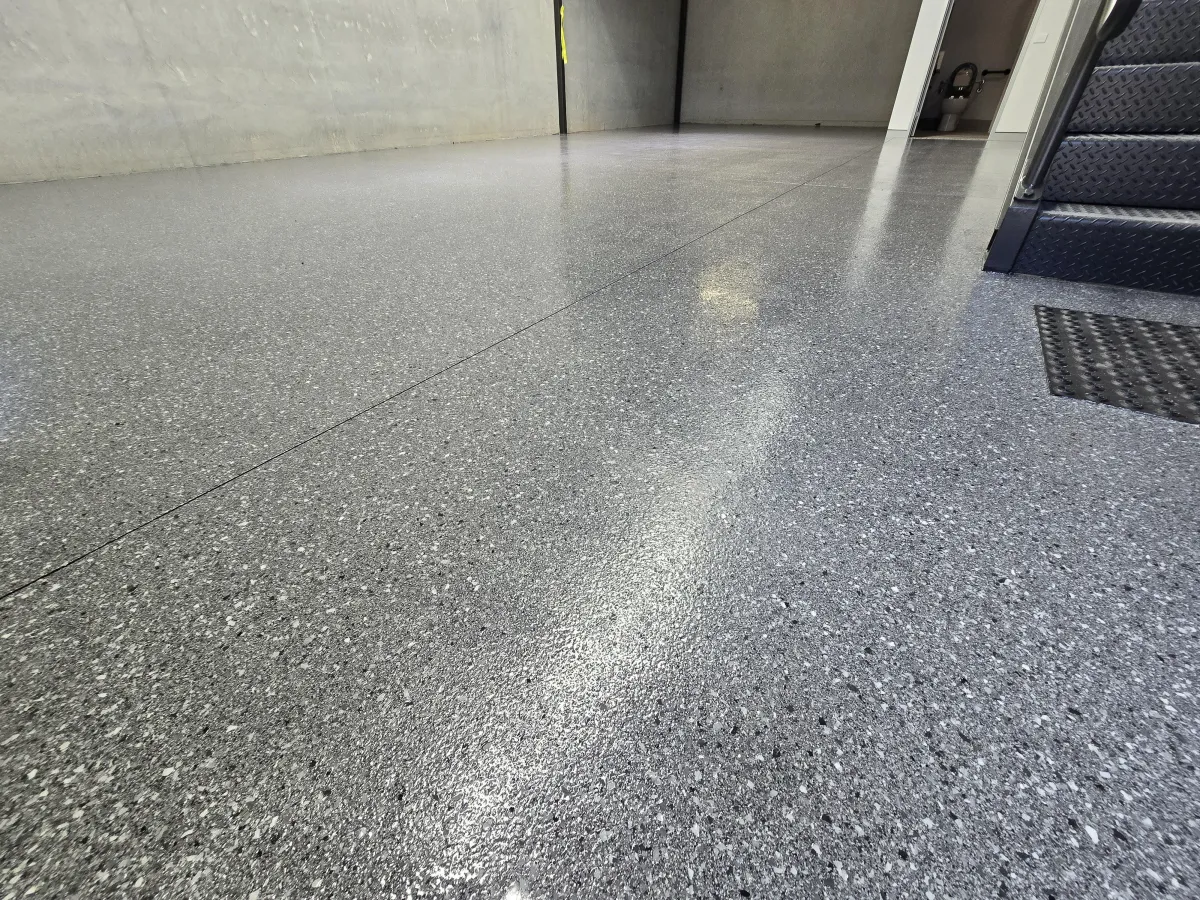 High-quality epoxy flooring installed in a modern garage