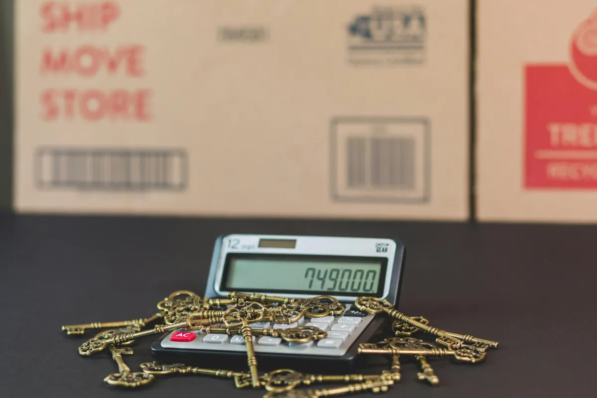 Calculator with keys showing home value, representing equity access and investment potential.