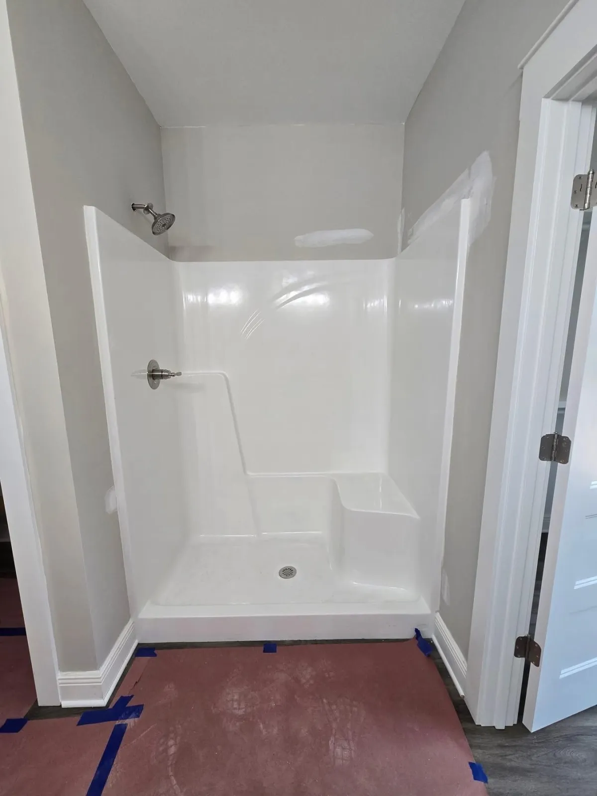 New shower surround in a bathroom