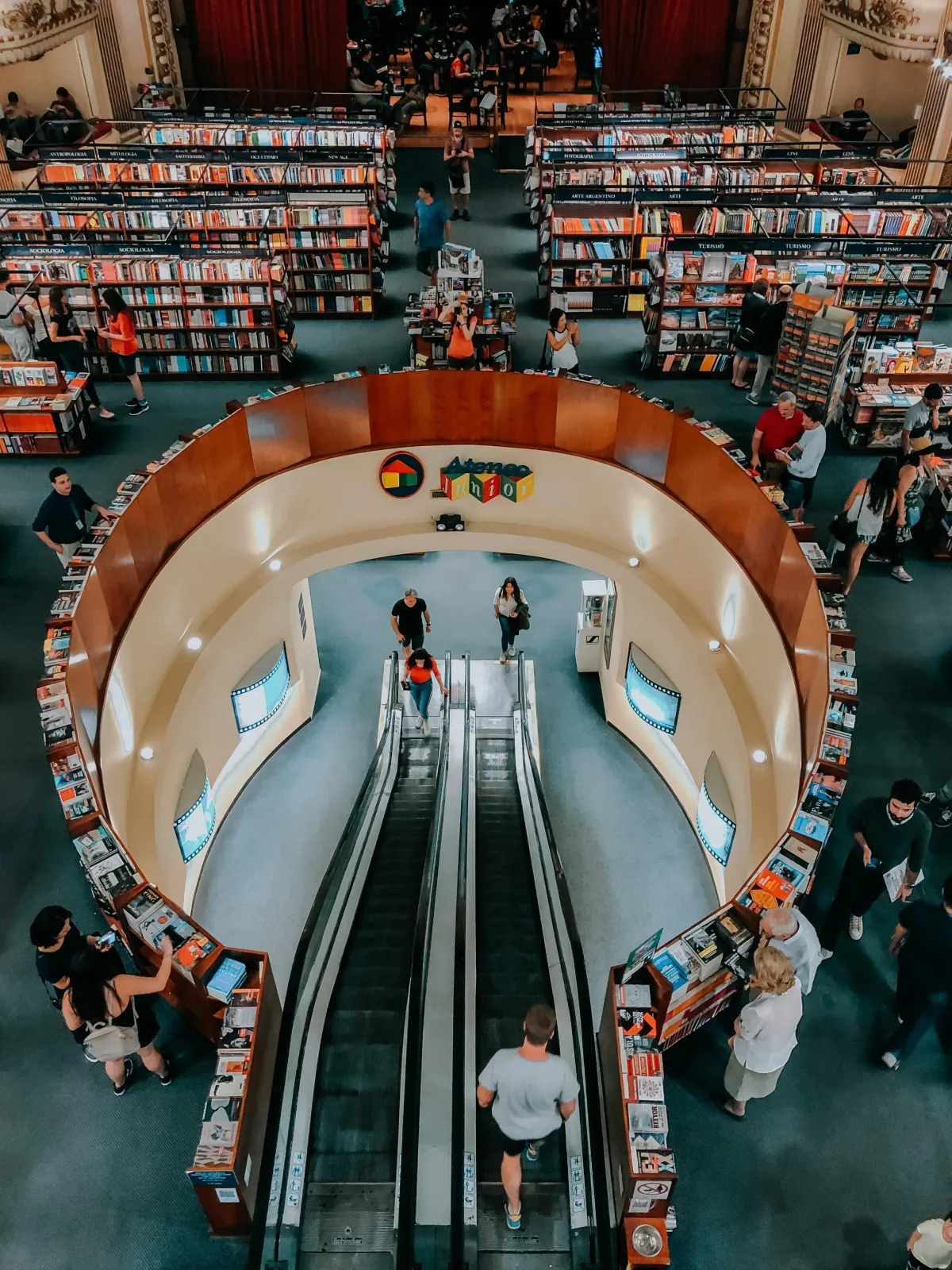 People in bookstore photo by Luciana Sena from Pexel