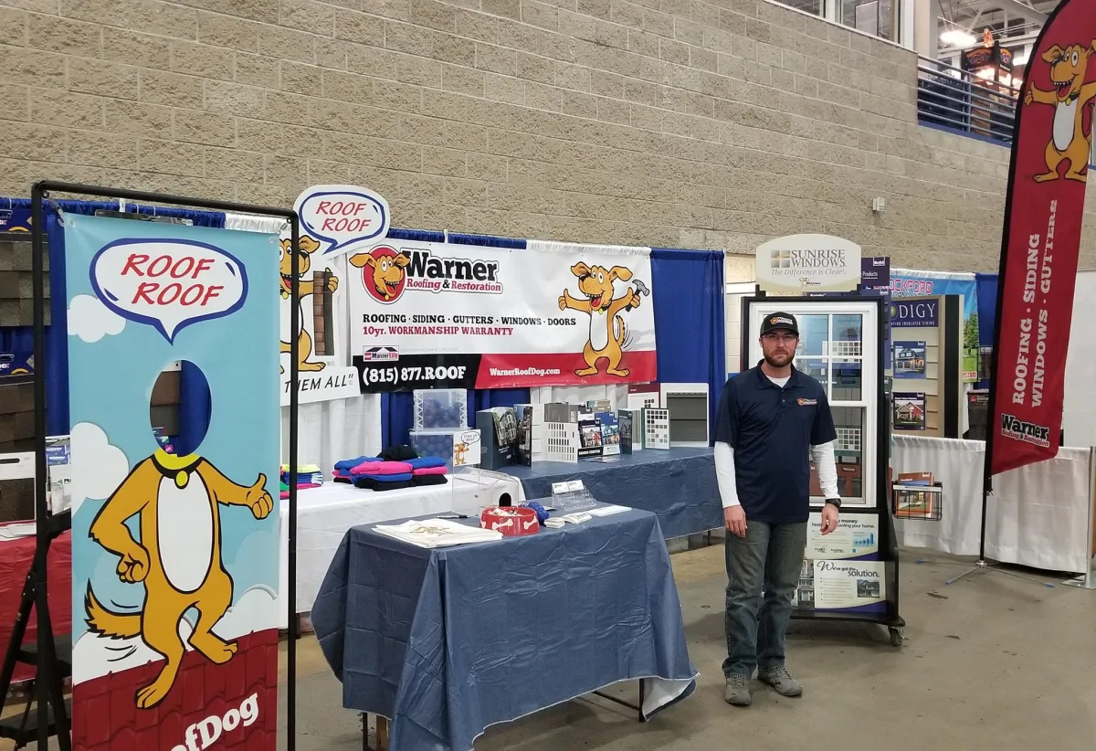 Warner Roofing & Restoration at the Rockford Home Show — licensed and insured, serving Rockford and surrounding areas with award-winning roofing, siding, and window services for over 14 years.