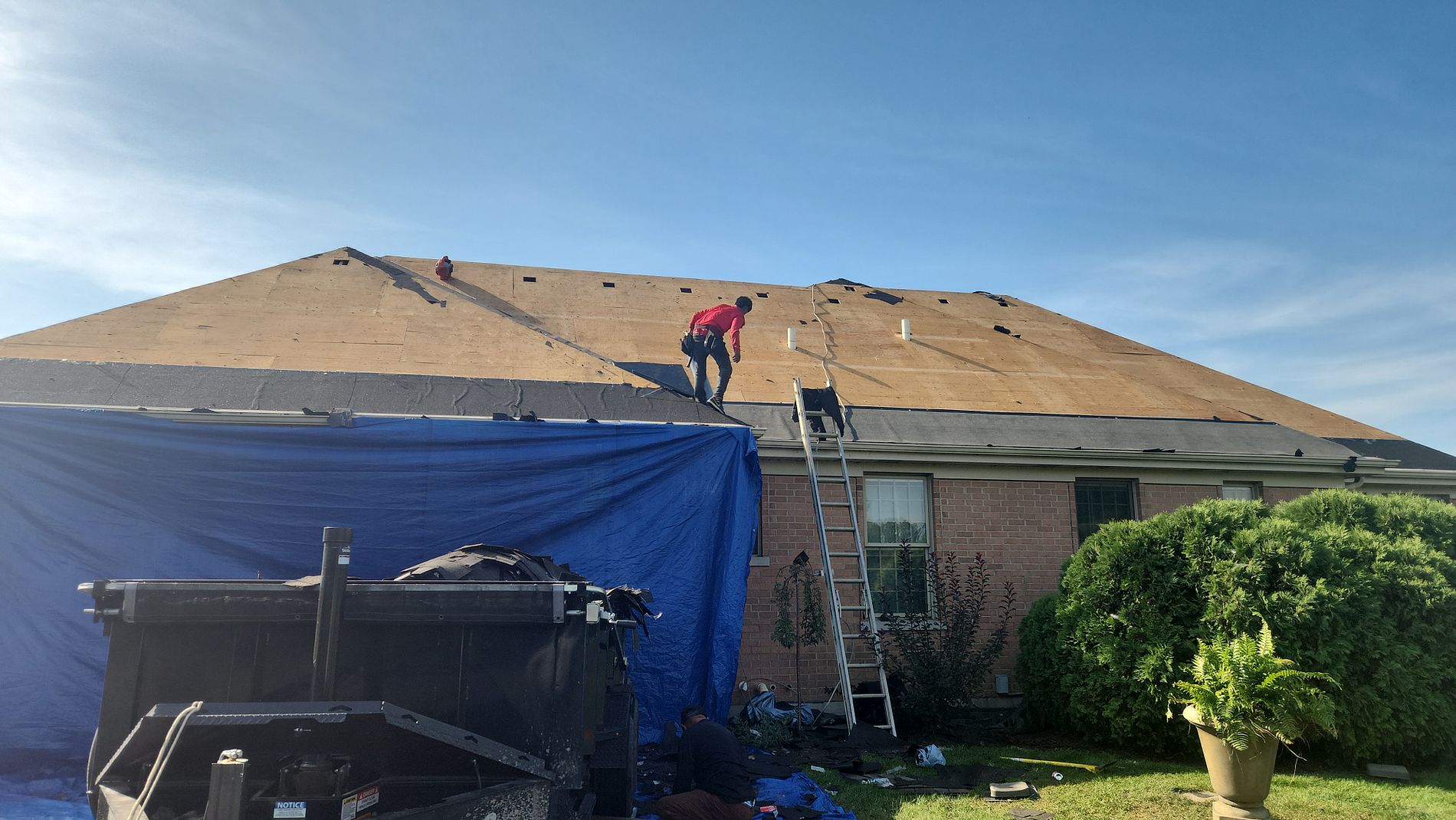 Residential roof tear-off in Harvard Illinois during a full roof replacement
