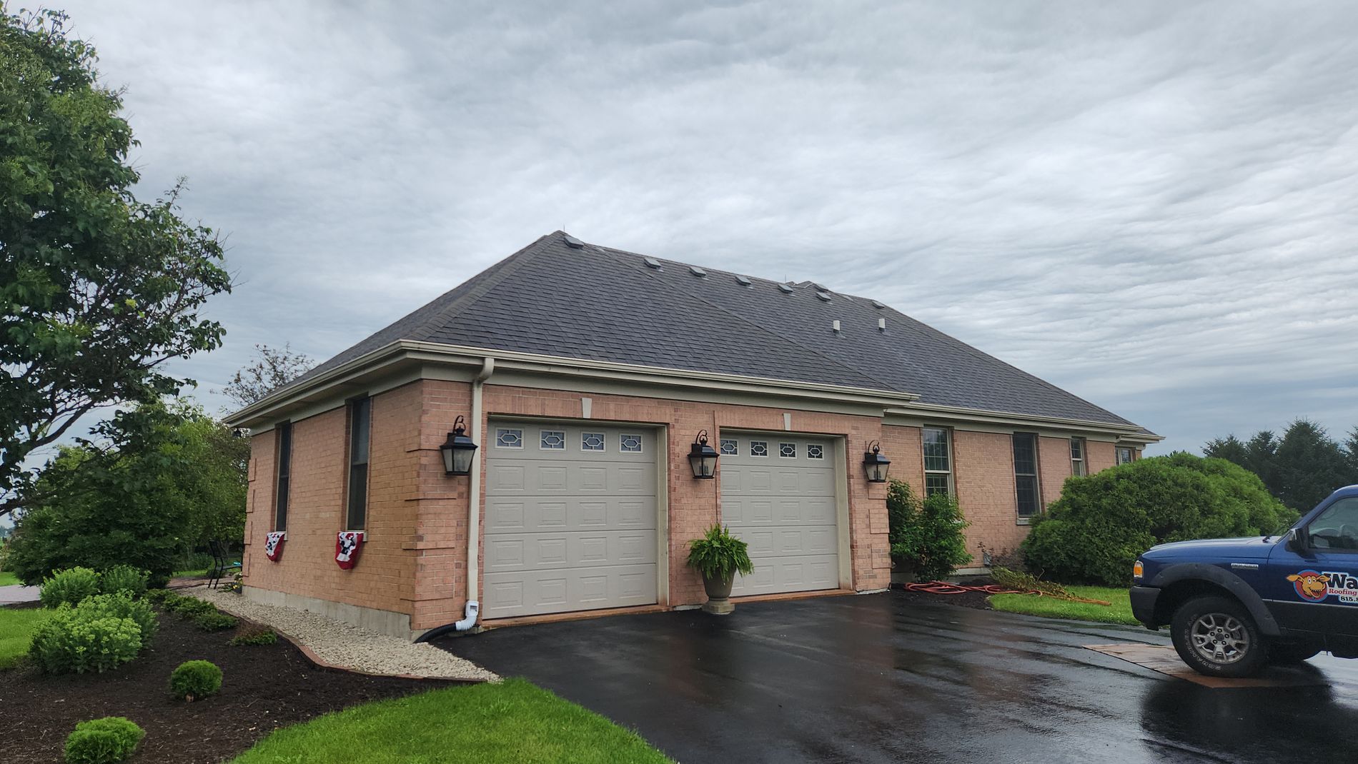 Asphalt shingle roof replacement in Harvard IL by a preferred contractor
