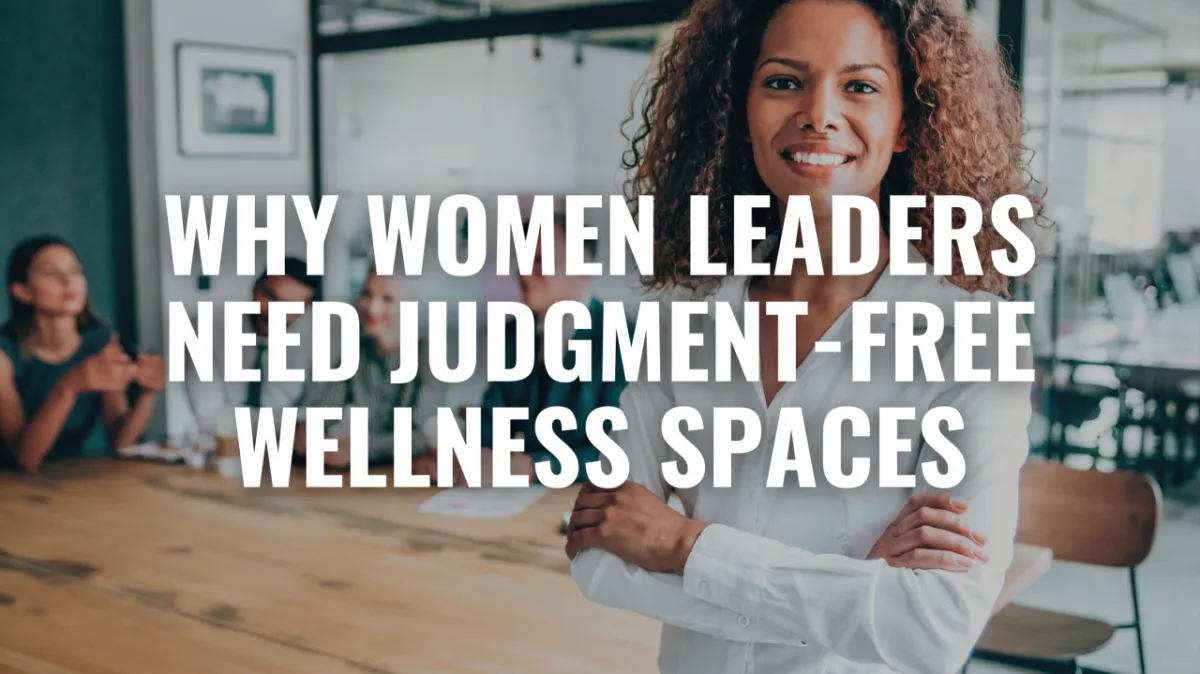 Confident woman leader presenting to colleagues demonstrating authentic leadership in supportive environment