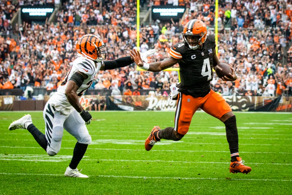 Watson rushes against the Bengals in 2023.