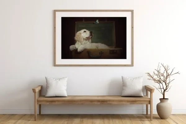 A pet portrait of a puppy displayed in a wall frame mockup shown hanging as wall art in a modern farmhouse entry hall