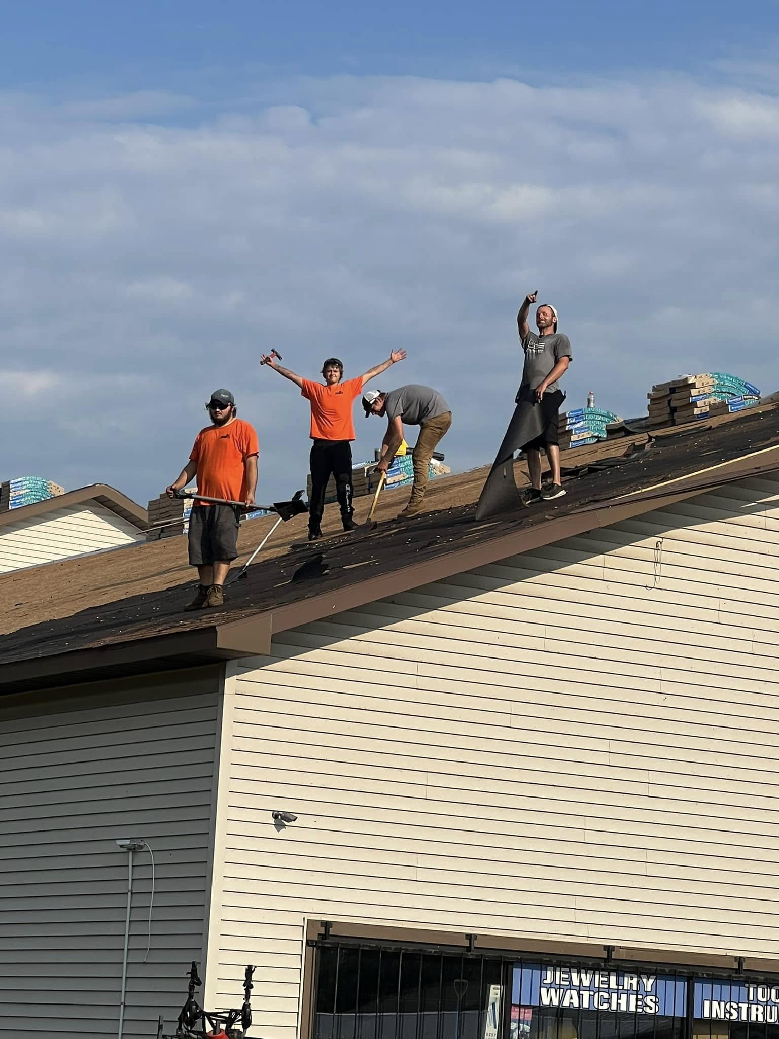 The K&M Team mid roof job