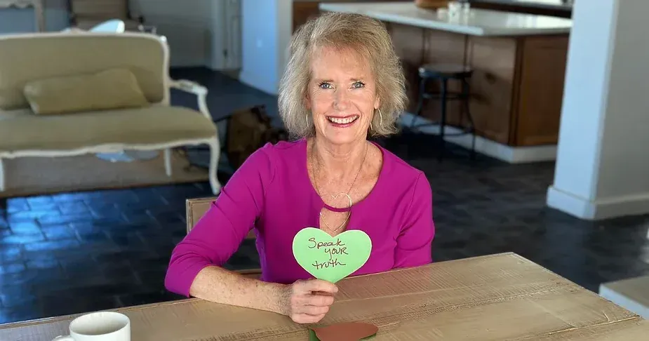 Lynn Kirkham holding a heart of public speaking: Connection