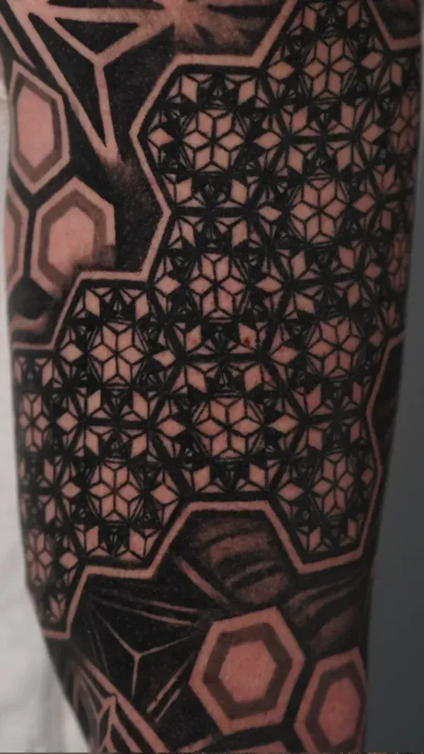tiny pattern geometric tattoo: Professional tattoo by Mickey Schlick at Montana Tattoo Company in Missoula, MT