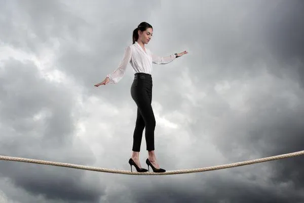 Woman Walking Tight Rope