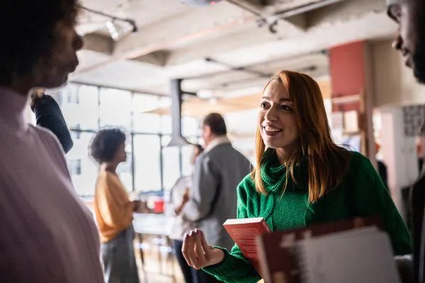 woman talking with a group