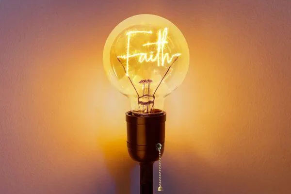 the words faith inside a lightbulb