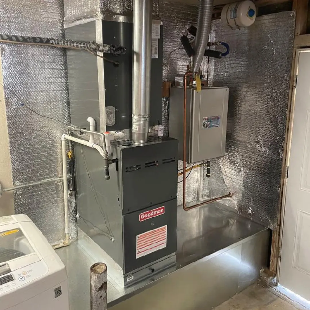 Goodman heating system installation in Long Beach, California, with insulated walls for energy savings and reliability.