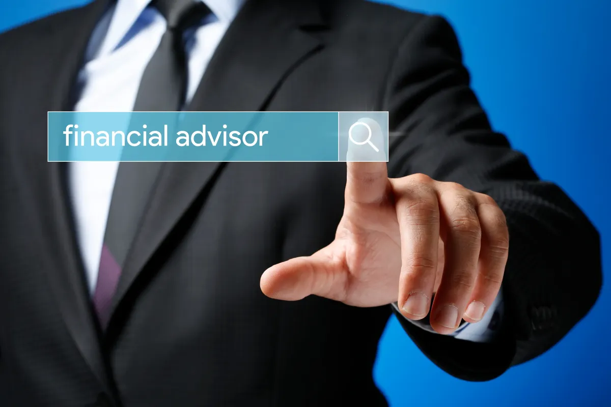 financial advisor hand touching a search bar