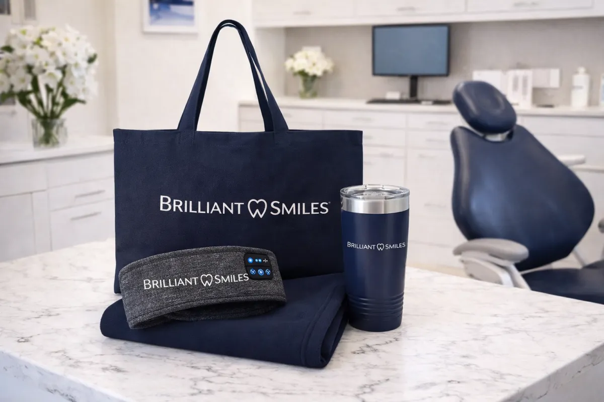 Branded dental patient comfort kit displayed in a modern dental operatory, representing thoughtful patient care and comfort-focused experiences
