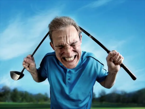 Angry Golfer with Club Broken on head