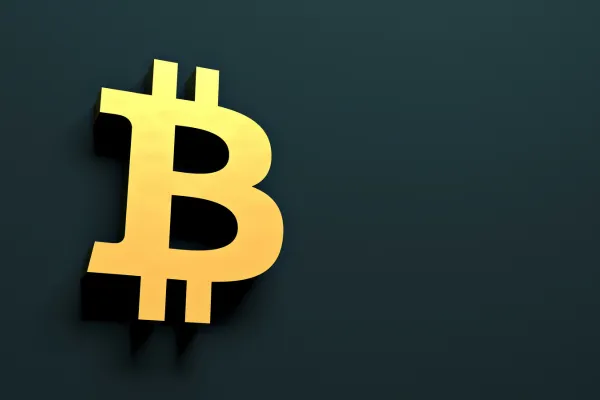 A 3D-rendered gold Bitcoin symbol on a dark green background, casting a subtle shadow.