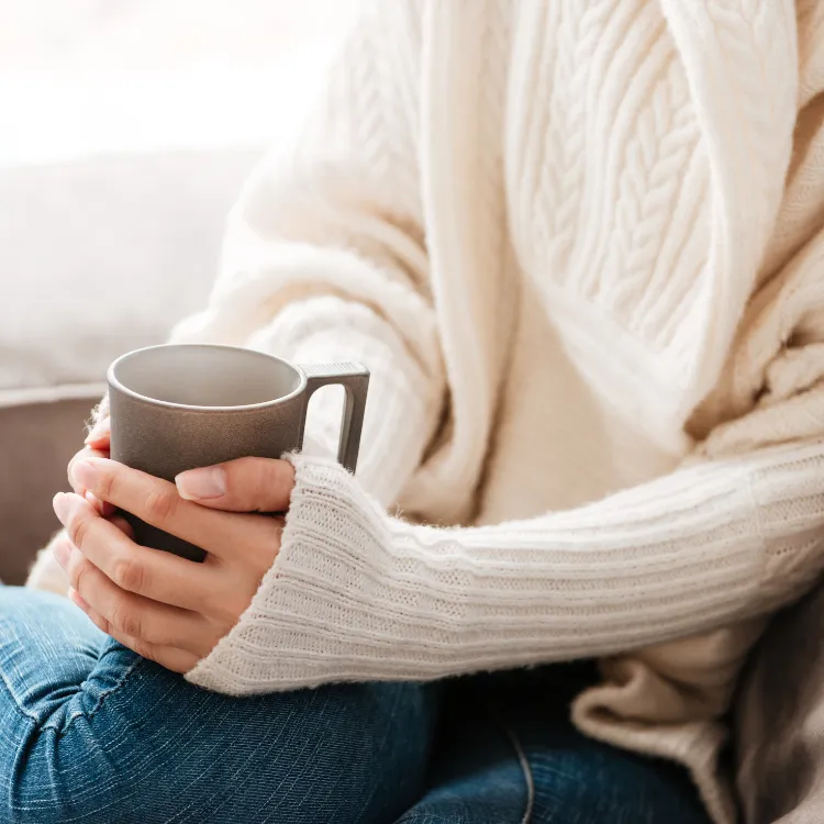 Hands resting in stillness, symbolising quiet grief healing