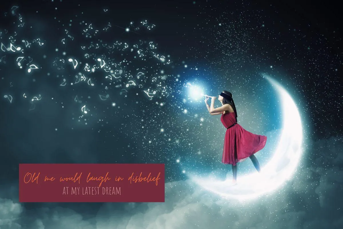 Woman in red dress standing on crescent moon
