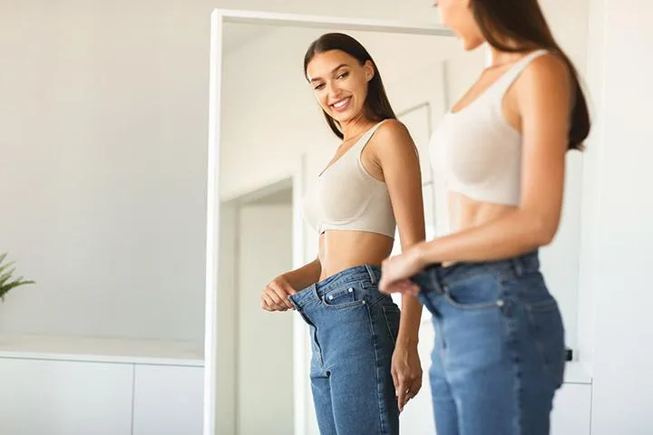 young fit woman losing weight