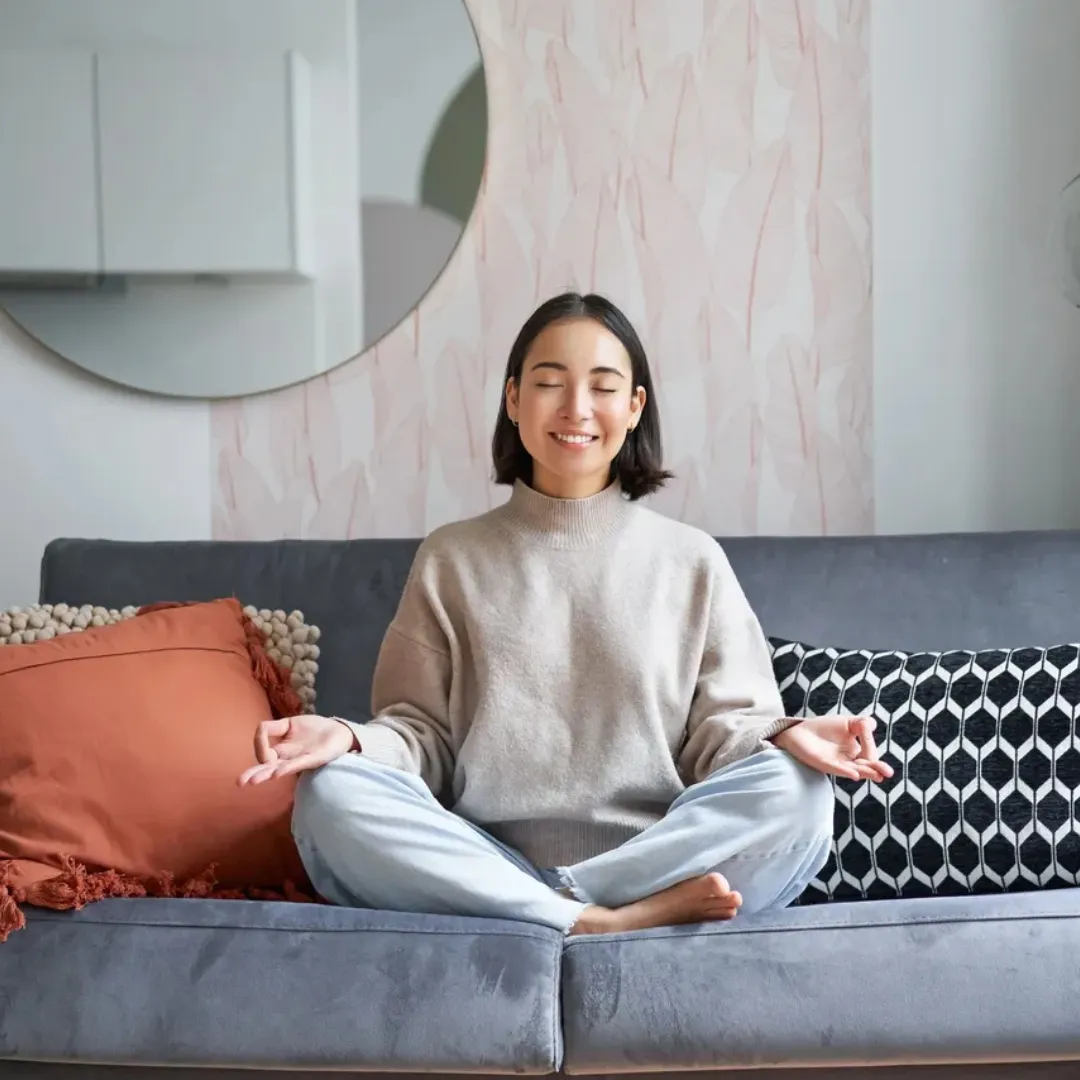 Woman on lounge meditating