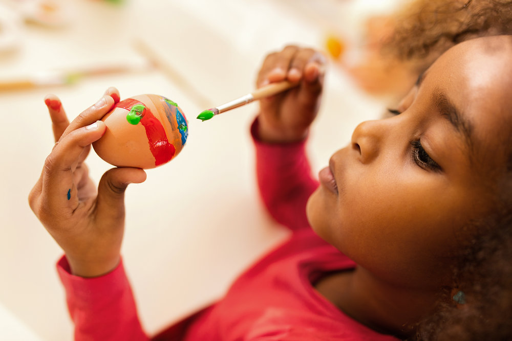 A joyful child playing freely, symbolizing innocence, imagination, and forgotten dreams. Get your free informational call on Christian counseling in 60637