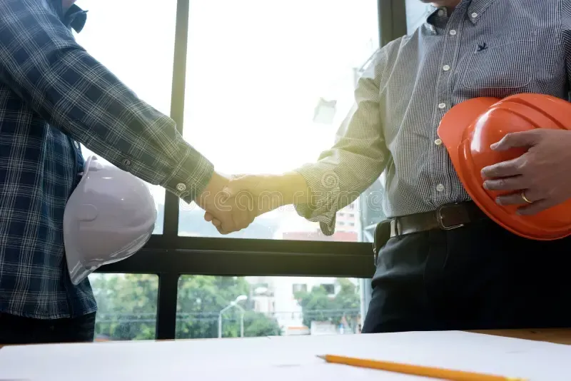 2 men shaking hands