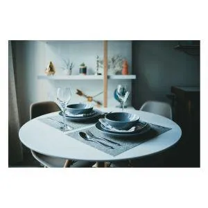two place settings at a small table