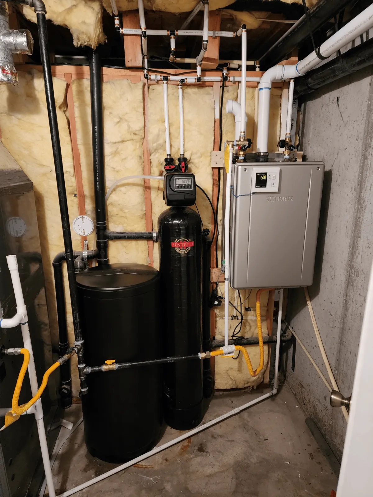 Tankless water heater and water softener installation by Abbott Plumbing & Drain in Tooele, Utah