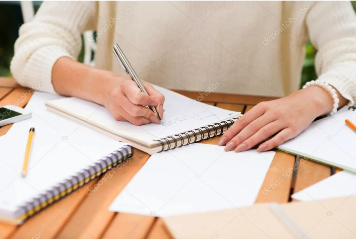 student writing college essay