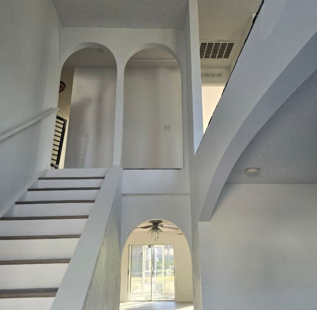 Before view of residential stair railing prior to custom metal fabrication in Jacksonville Beach FL