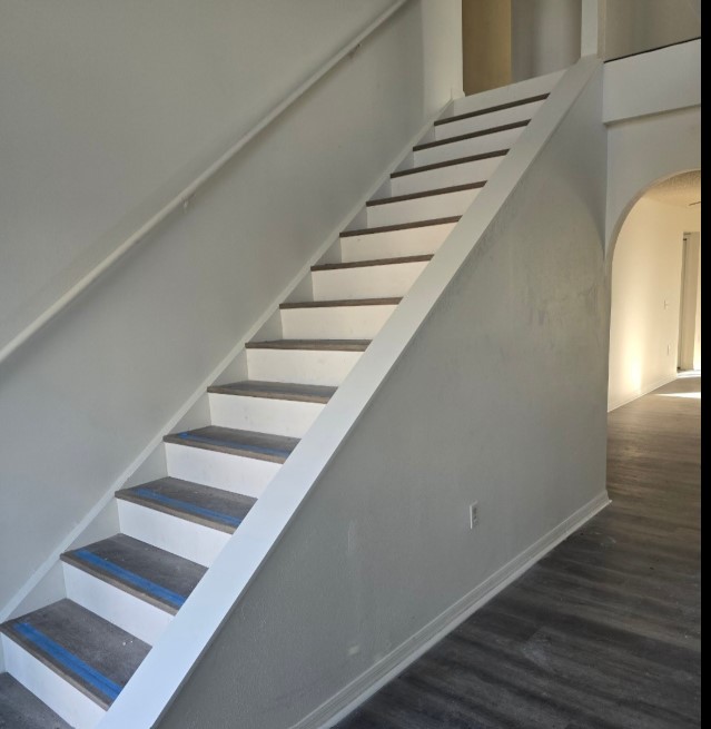 Before photo of interior bannister removed for custom architectural metal upgrade in Jacksonville Beach FL