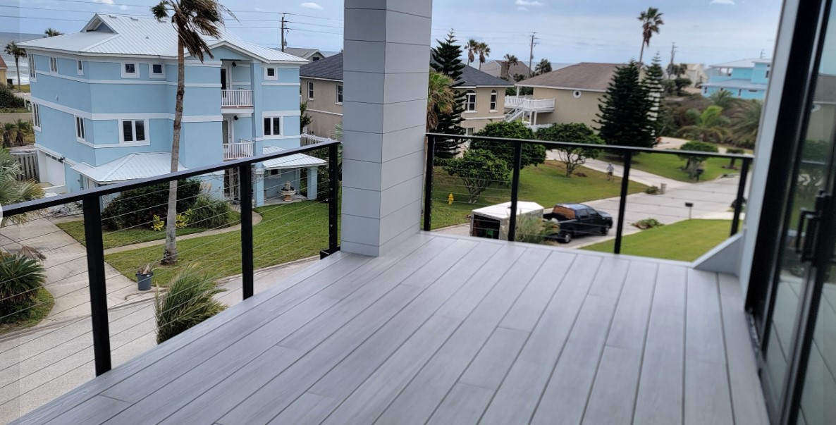 Second floor porch custom welded bannister overlooking exterior of Ponte Vedra Beach Florida home