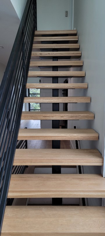 Custom metal staircase railing installed throughout three story beach house in Ponte Vedra Beach FL