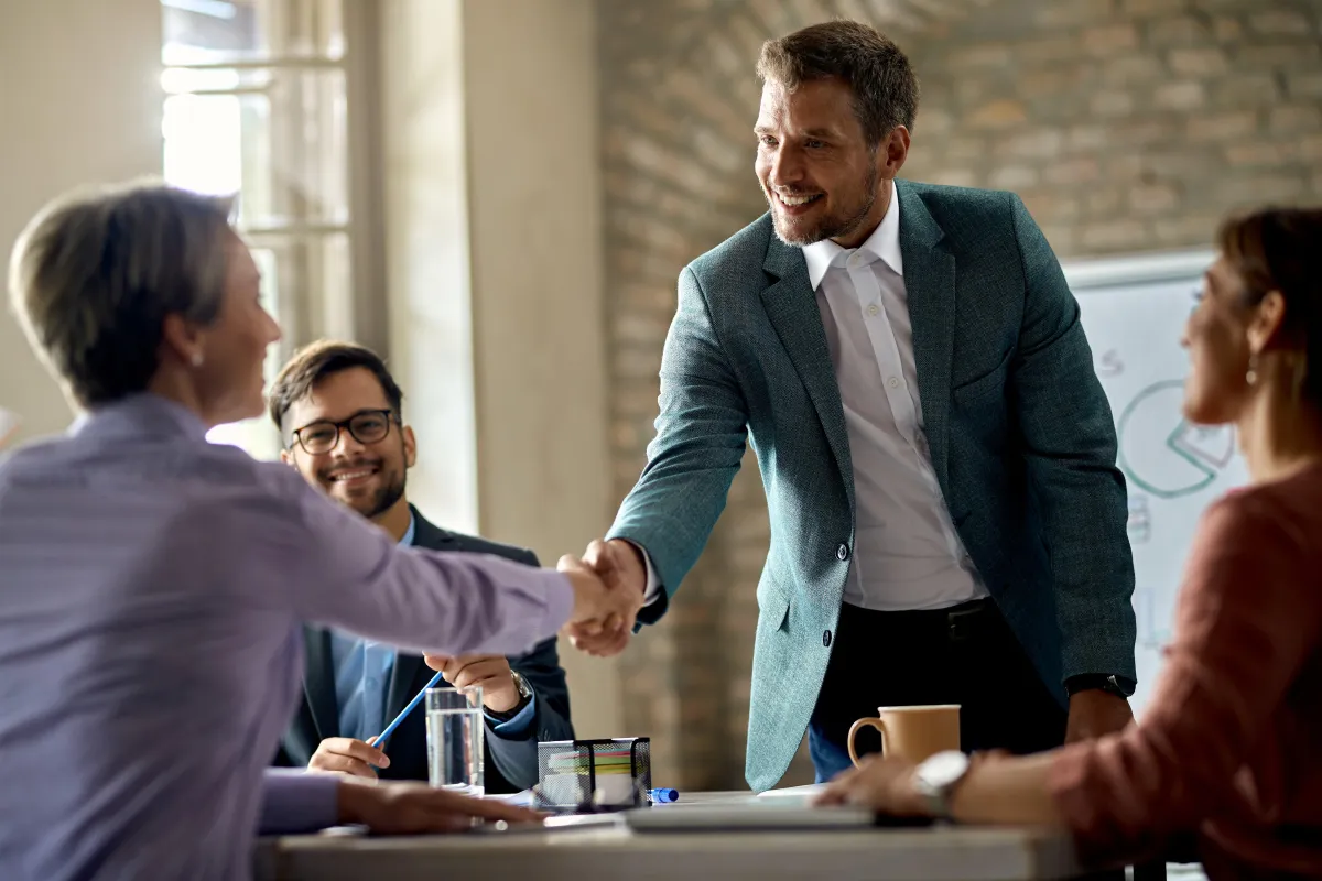 Business partners shaking hands