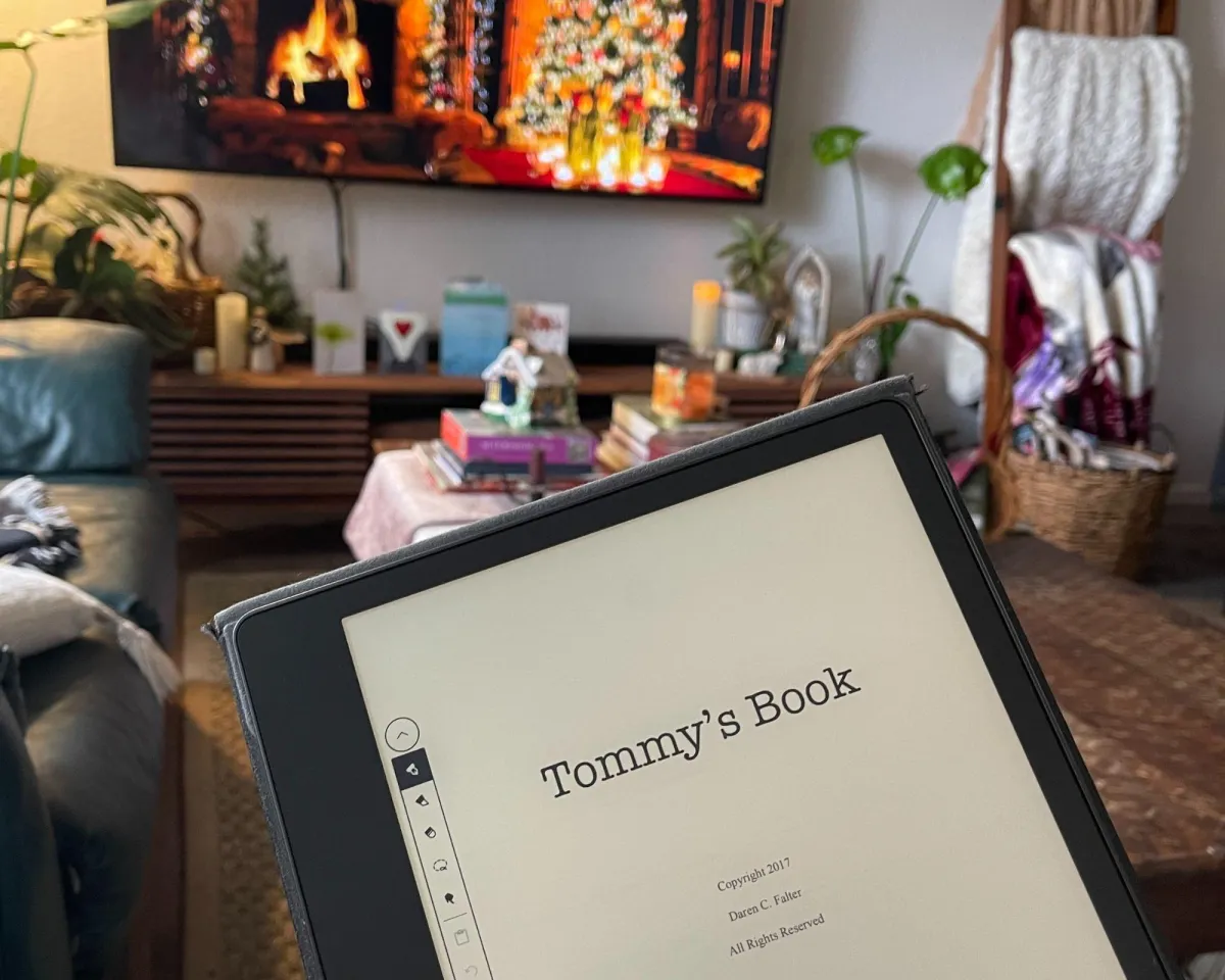 Reading on a kindle in front of a cozy fire