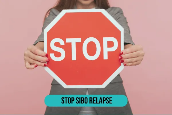 A woman stands confidently holding a stop sign with the words "Stop SIBO Relapse" written on it. She has a determined expression, symbolizing the importance of preventing Small Intestinal Bacterial Overgrowth (SIBO) relapse. The sign serves as a clear visual message of taking control of health and avoiding setbacks in managing SIBO.