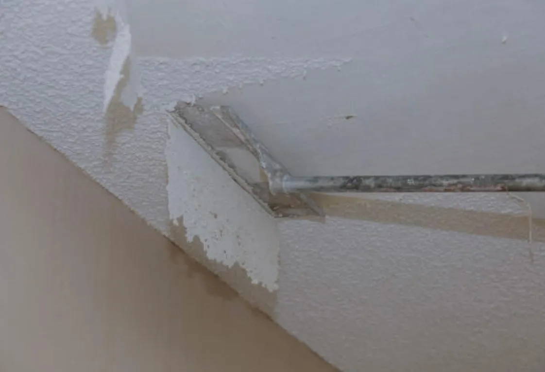 Popcorn ceiling removal in schools and educational institutions.