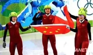 Olympic gold medal celebration by China’s women’s short track speed skating team, symbolizing elite performance and mastery.