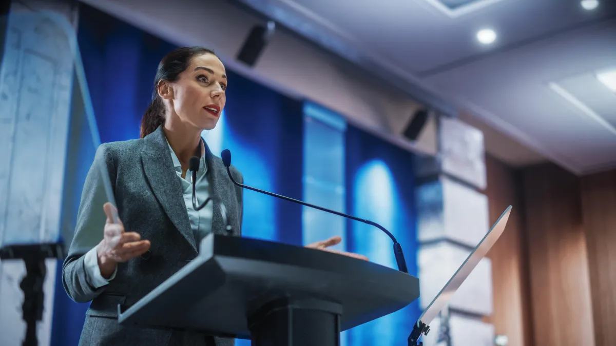 Woman at lectern