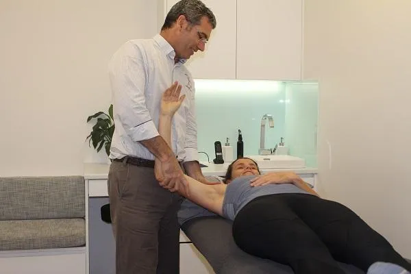Physio treating client