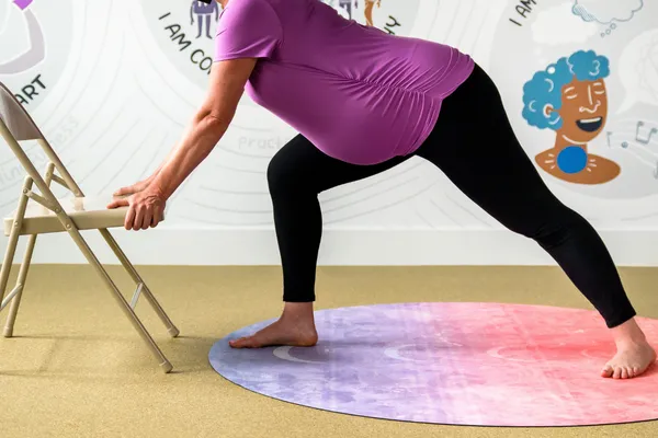 5 Yoga Poses to Ease Lower Back Pain During Pregnancy