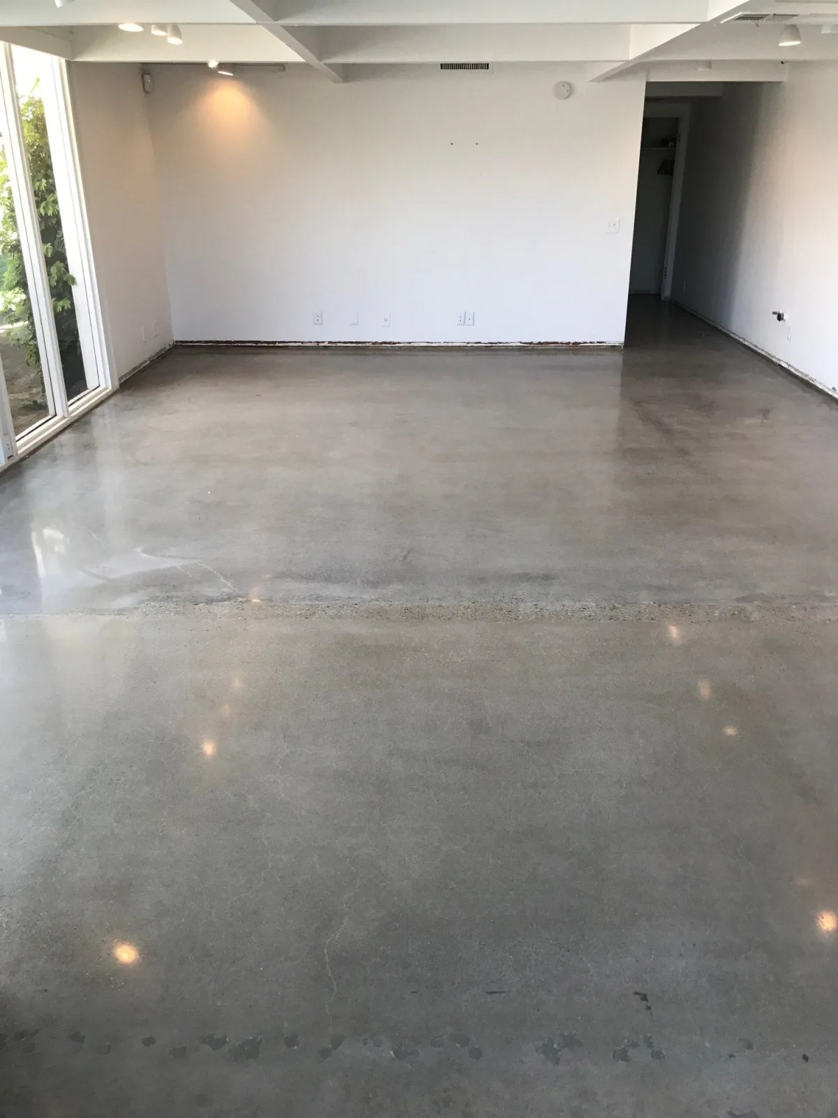 Polished concrete floor by Infinity Concrete Coatings
