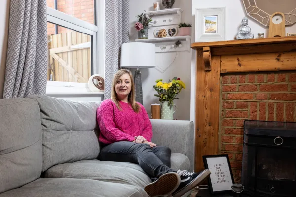 Photo of Rachel Allen on her sofa