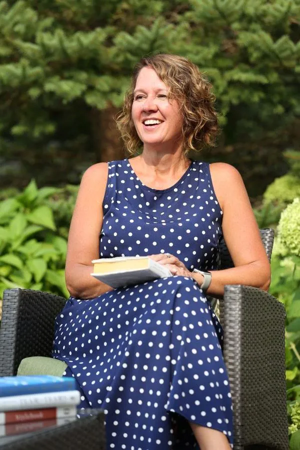 Laura smiling on the patio